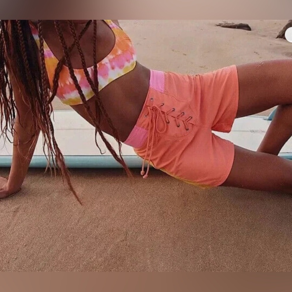 🆕 Free People x Its Now Cool board shorts in pink and orange size small.